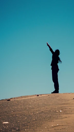 Side view of a person standing alone with fists outstretched