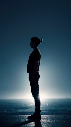 Side view of a person standing alone with fists outstretched