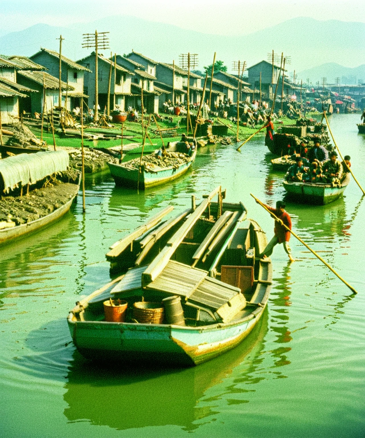 several people are on small boats in a river with houses, 1970s philippines, kowloon walled city style, hong kong 1 9 5 4, fishing village, 1960s color photograph, slums, a still of kowloon, 1 9 7 0 colour photography, slum, shanty town, manila, stunning visual, kowloon walled city