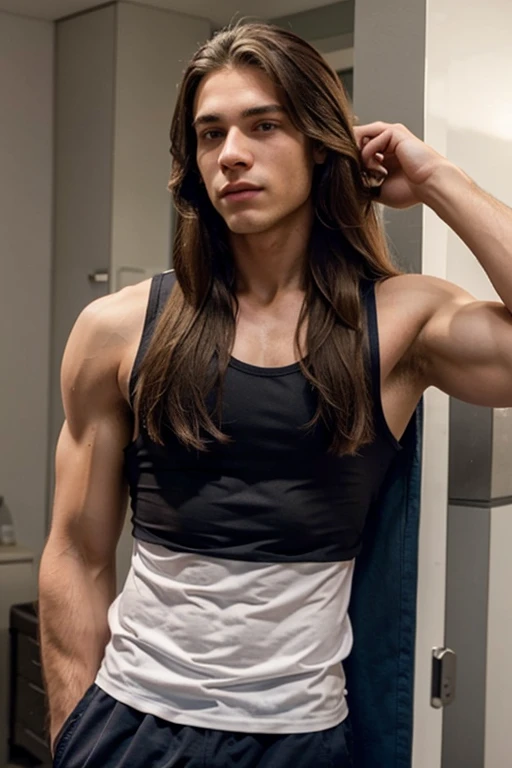 Muscular high school guy in tank top with long hair