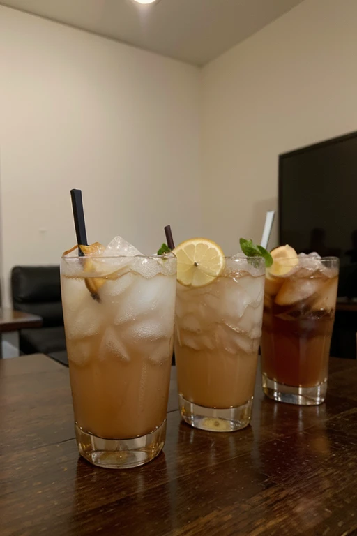 Point of view of four drinks on a table 