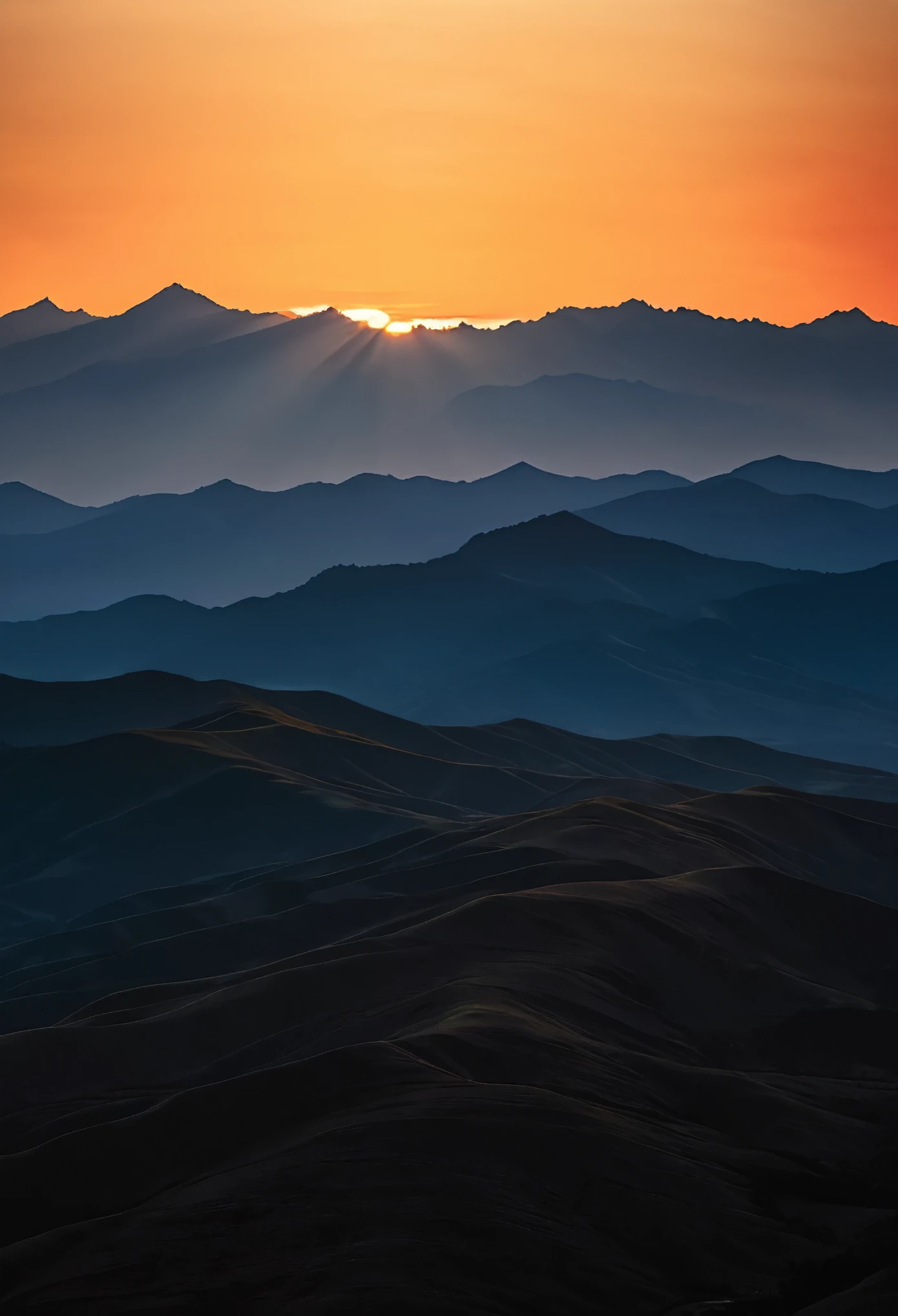 Sunset, Sun under the horizon, Sunset light stretching in a straight line along the edge of the sky and the landscape, Sky gradually darkening, Silhouette of mountains, Ethereal transition from day to night, Detail and Clarity, Sharp silhouettes of mountain ridges against the sunset sky, Dramatic contrast between the bright sunset and the darkening landscape, Peaceful and serene