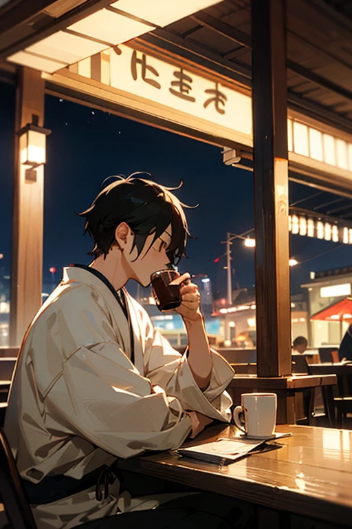 A Japanese man drinking coffee at a cafe with a great night view