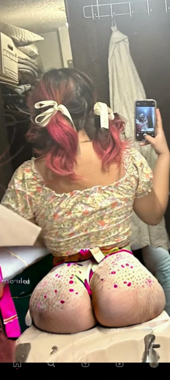woman with pink hair taking a picture of herself in the mirror, wearing pink hair bow, pigtails, colorful pigtail, wearing underwear, with pink hair, wearing pink panties, back of the hair, roses in her hair, pink hair covered with hairpins, view from the back, curvy and bow, shot from the back, thick bow, insanely inflated hips, beautiful girl, big ass, huge ass, bbw, from behind, thick, thick thighs, wide hips, bbw, big , sideboob, giant ass, side view, big butt, round butt, tight underwear, underwear halfway off, underwear taking off, grabbing ass, ass spilling over underwear, too thick for clothes, side angle, chubby stomach, big , filipina, fat ass on sink, not nsfw