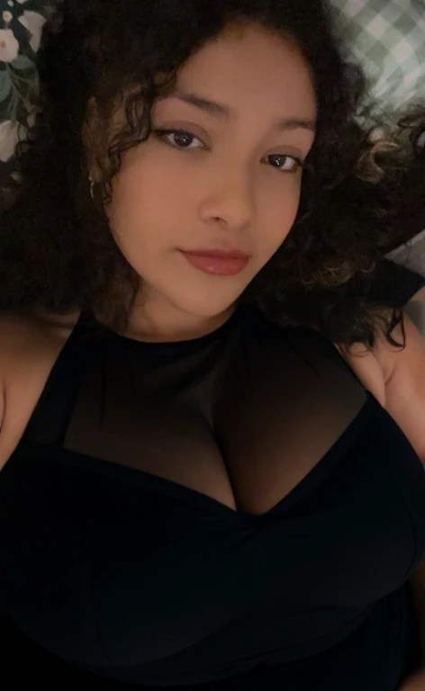 there is a woman laying in bed with a cell phone, taken in the early 2020s, profile image, around 1 , selfie of a young woman, 18 years old, alanis guillen, headshot profile picture, profile pic, 30 years old woman, 3 0 years old woman, her face framed with curls, Big tits, huge , no clothes, sexy, cute, minimal clothes, thick, bbw, chubby stomach, thick nipples, nipple piercings, large areola, hard nipples, piercing through shirt, nipples hard through shirt, busty, major cleavage, naked, ripping through top, spilling over sides, bra too tight, giant , extra wide hips, upper body zoom in, showing off huge , fat stomach, see through top, fat bbw, large areola showing, major cleavage, latina, down to stomach, wide hips, sexy, upper body zoom, thick arm, showing off , top half only, showing only upper, only a bra, showing off cleavage