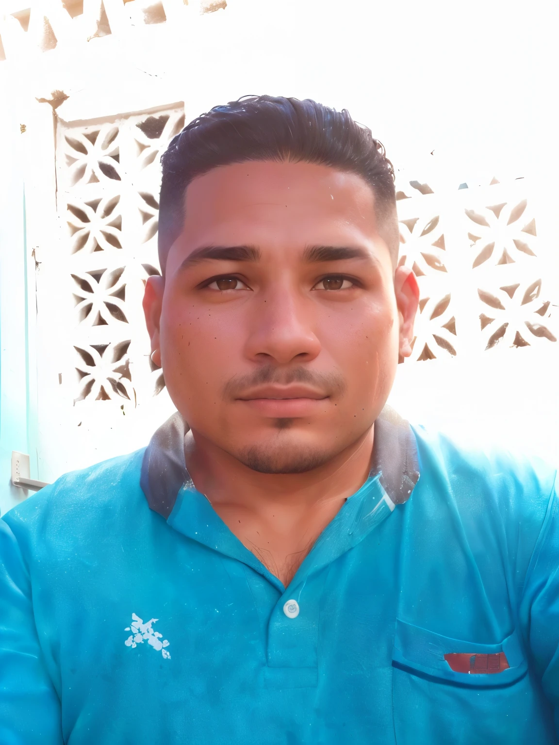 Hombre arafed con una camisa azul sentado frente a una pared blanca, zigor samaniego, eloy morales, christian orrillo, jose miguel roman frances, juan diaz canales, joseph moncada, 4 0 year old man, brian pulido, victor maristane, andres rios, carlos ortega elizalde, joel torres
