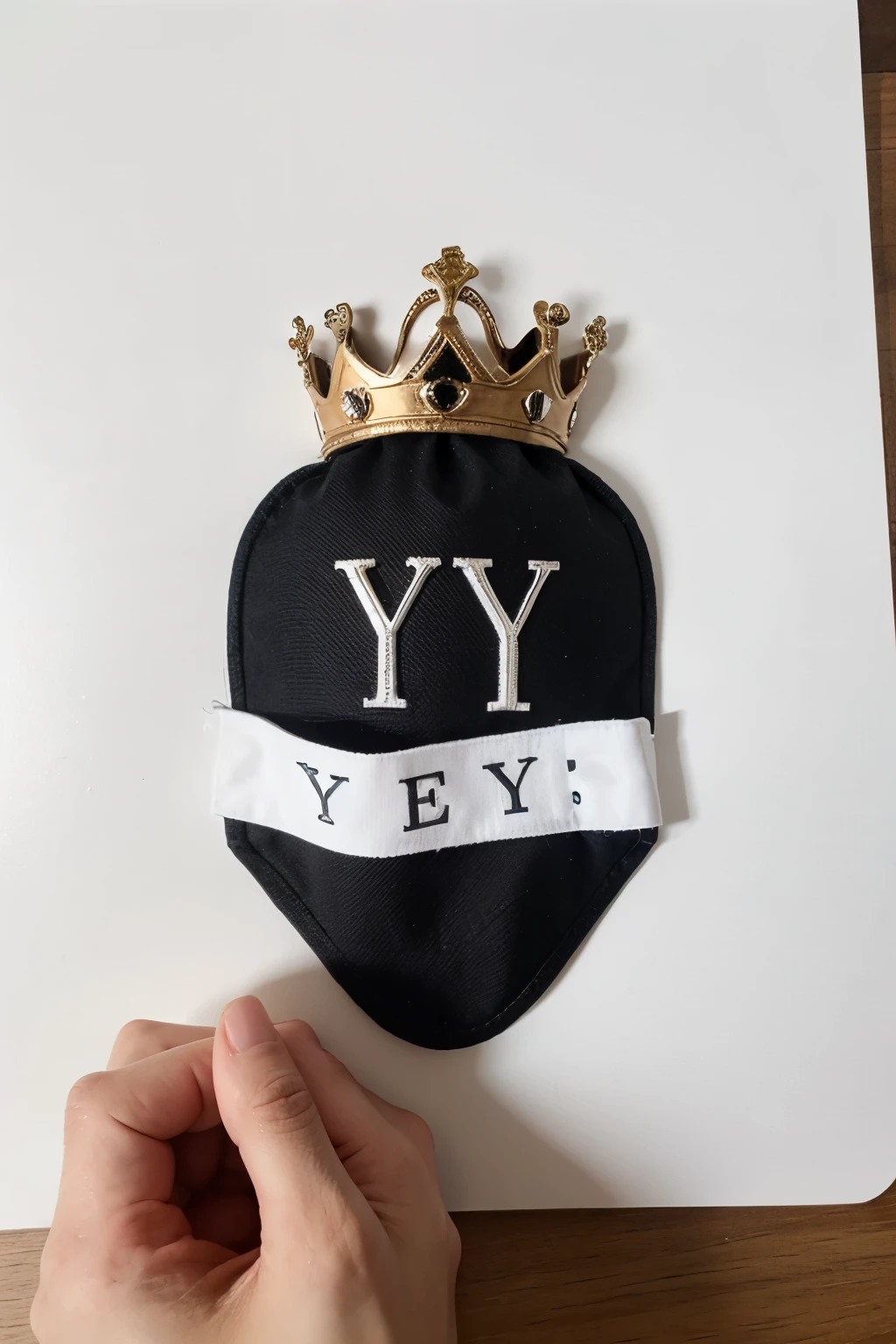 Create a logo with the letter YE and have a crown at the top and at the bottom write the word YULIAN