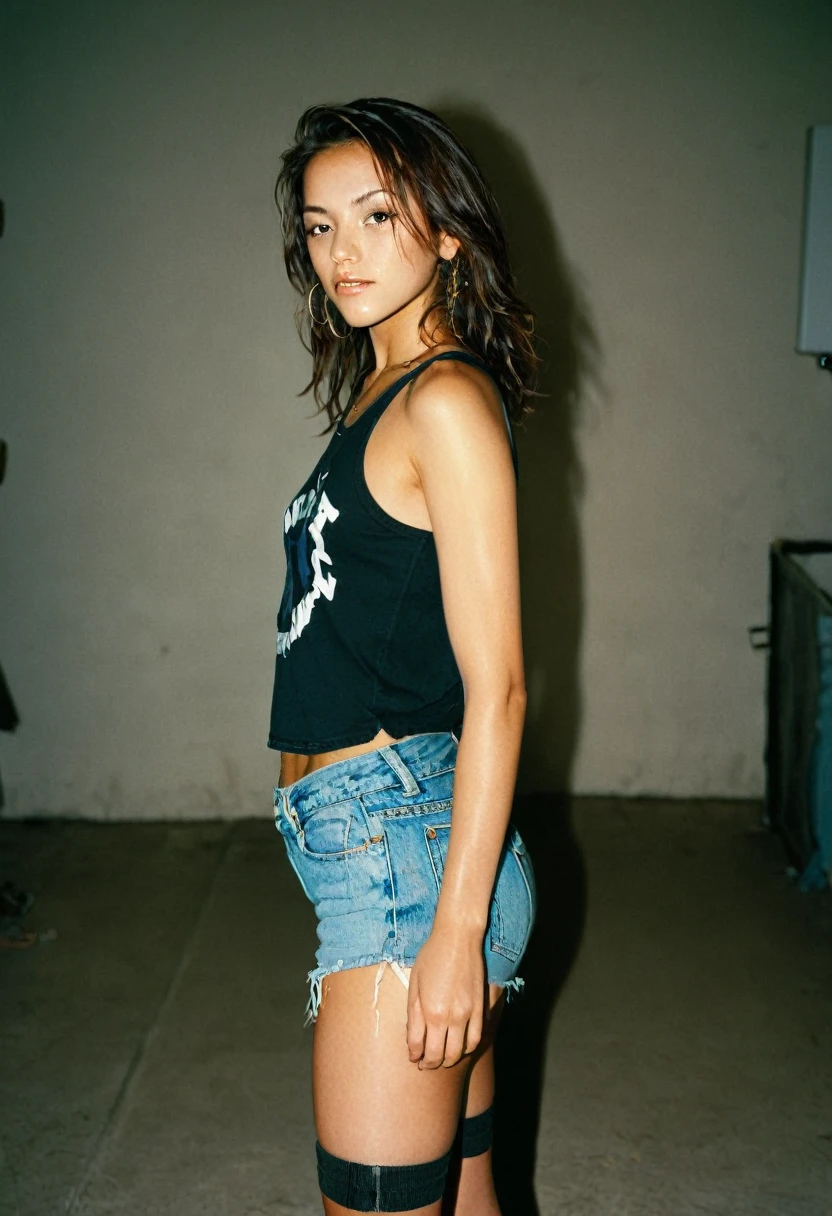 photograph of beautiful woman, photorealistic, analog film photograph, masterpiece, soft light, ultrasharp, photorealistic, bokeh, photographic image from an Olympus OM1, Ektachrome 400 film, 120 mm lens, professional photographer, mario testino, yoko, back view, wearing a sleeveless cutoff t-shirt (SFW) micro jean shorts, looking at viewer, saturation:0.5
