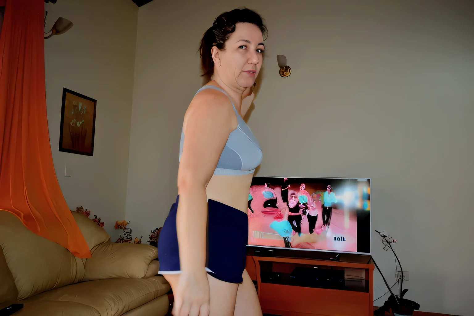 woman in blue shorts and mixed gray top, in front of a television, sports bra and dark blue shorts, sports bra and shorts, fitness body, 4k, dancing in the background, working out, training, attacking the camera: 4, toned backside, doing a cheeky pose, with the middle of the waist up, extremely hot and sexy.
back photo, toned back, back photo, from behind. Beautiful woman, slim back, 38 years old, pretty woman, dark brown eyes, ((beautiful slim woman, 38 years old, hair color [black hair], hair [pixie cut])), earrings, lips, realistic, slim waist , charming, pink lipstick, colorful makeup, long chosen, earrings, wears eyeliner, fair skin, (sexy), (detailed face), detailed eyes, detailed iris, sexy look, looking at the viewer, (hot), beautiful body and soft, voluptuous woman, crop top, thong, shorts, ((full body))