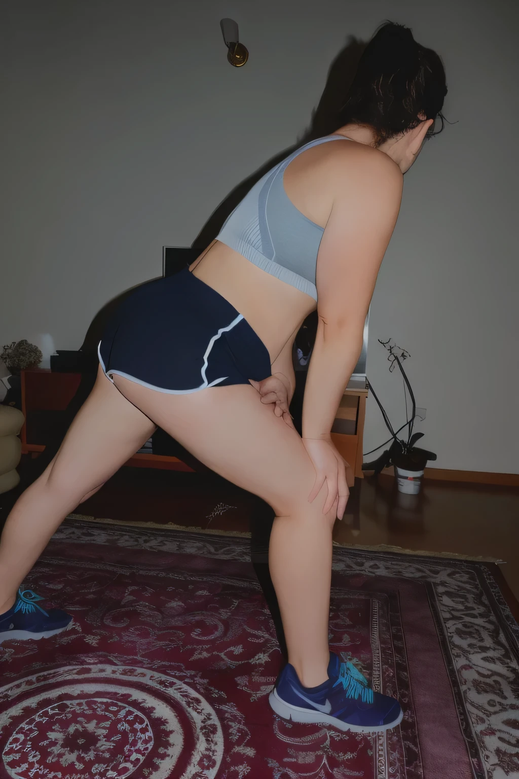 woman in a sports bra top and shorts stretching, fit pic, exposed thighs!!!, side pose, working out, leg and hip shot, sport bra and dark blue shorts, in shorts, thighs!!!, thighs!!!!!!, thighs focus, lunging at camera :4, back arched, long shot from back, legs visible, bent over posture