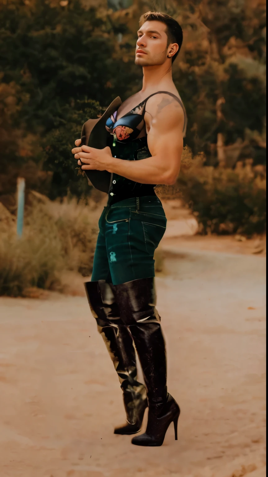 Hot masculine , muscular hunk cowboy in tight jeans heels boot and padded bra, with earrings and tattoos