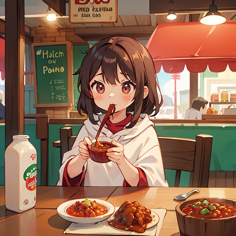 Girl wearing a poncho eating chili con carne at a Mexican food stall
