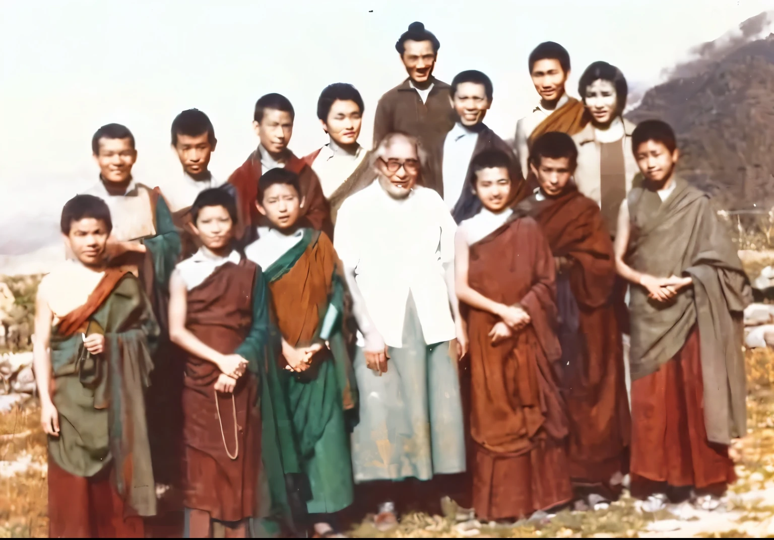 A group of people stand in the field，A mountain in the background, Omar Shanti Himalayas , Buddhist, group photo, Image, photo, Monk, School Class, 1 9 5 6, 1956, Tie Kang Jin Ruite, [ rich and colorful, 2134, 1957