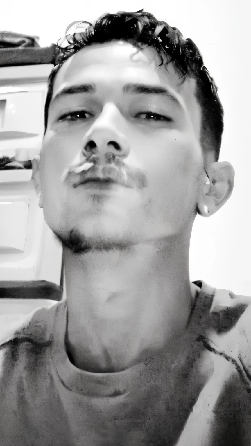 arafed man with a mustache and a shirt on sitting in front of a refrigerator, desaturated!!, around 1 9 years old, potrait, desaturated!, black and white picture, bored, taken in the early 2020s, portrait!!!!!!, desaturated, old picture, b&w photo, chilling, squinting