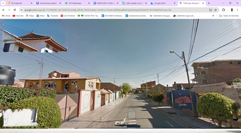 Aerial view of a street with a sign and a sign., vista de calle, google maps vista de calle, vista de calle, google vista de calle, vista a nivel de calle, found on google vista de calle, taken in the early 2020s, en medio de la calle, amazingly composed image, imagen de muy muy baja calidad, parado en una calle del municipio