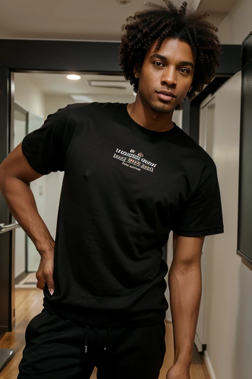 Straight brown skinned man black hair afro green eyes size tall skinny in black jogging pants and large t-shirt 