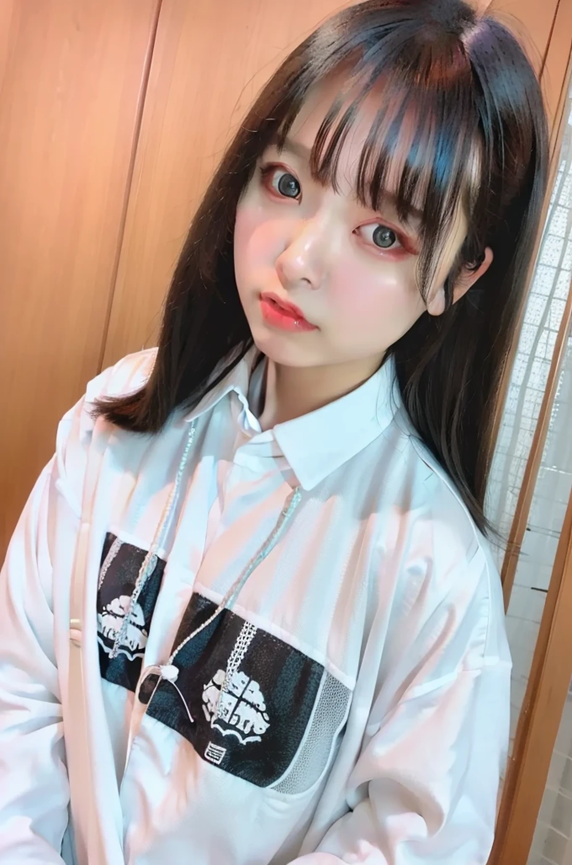 highest quality, Ultra-high resolution, (Realistic: 1.4), Oversized jacket, White shirt, To the camera, A man who looks like a woman、Double、Black Hair、Mash Hair、Home、Japanese-style room