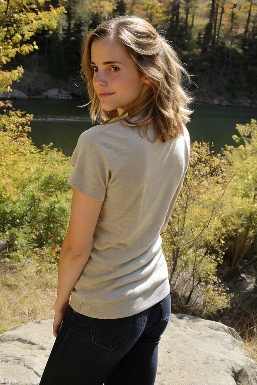 Photograph of emma2009 woman, hiking outdoors, warm spring day, hiking clothes, 3/4 shot. Under view , back view, looking on viewer, ass