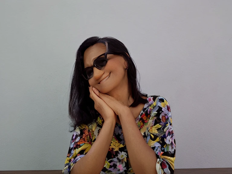 Senior woman wearing glasses and dark floral blouse smiling, estilho pixar, high resolution, melhor qualidade
