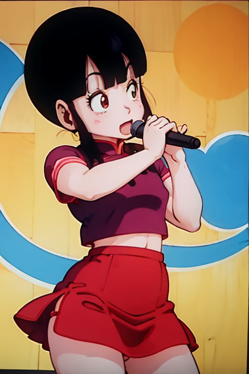 8-year-old、Girl with black bob hair、He seems to be singing with pleasure.、Holding a microphone、summer、Short sleeve、Red Skirt、Shooting from below