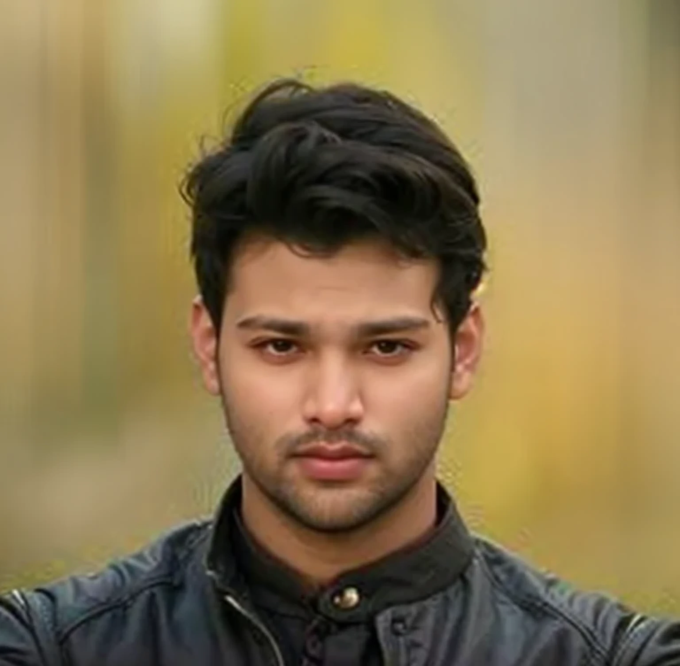 A beautiful young bearded man with highly detailed skin looking at the camera,8k,high res, soft light,no contrast,ultra realistic, photorealism.((real life photo,realistic:1.9, short beard:1)),(wearing black sherwani),((closeup shot:1.5))