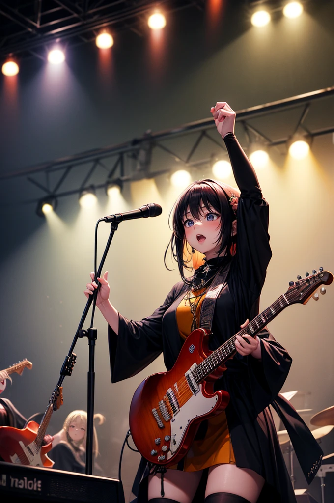 A three-woman metal band dressed in witch costumes、Arrived in Japan and held a mass at a live venue、Neck slashing pose、The intense performance was a huge success、Metal band performance、Fearless expression、Live venue lighting、The band&#39;s concept was a reaction to the witch hunts that swept through medieval Europe.、Electric guitar