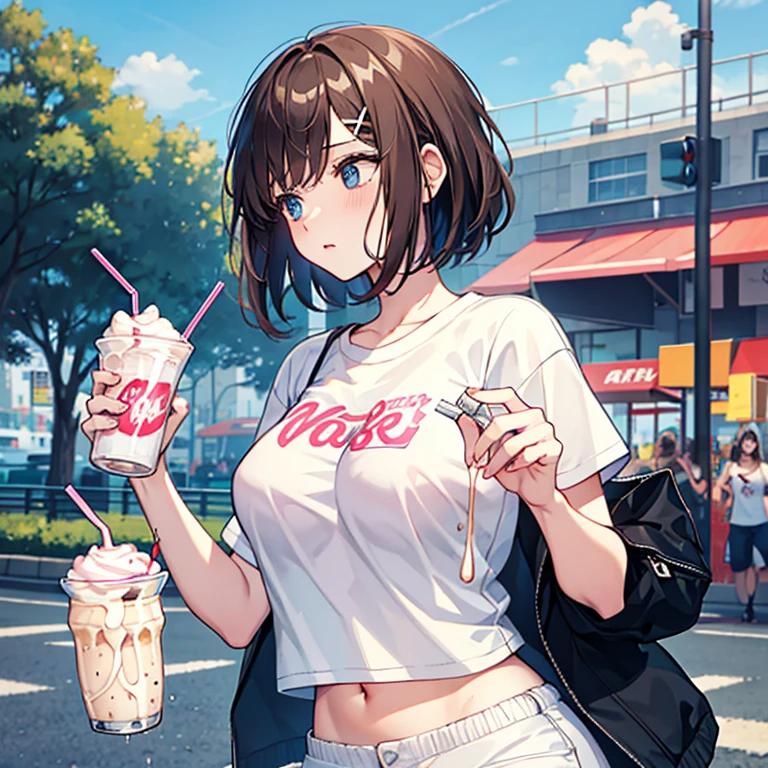 a woman drinks a milkshake, milk drips on her chest, shorts, T-shirt, park background