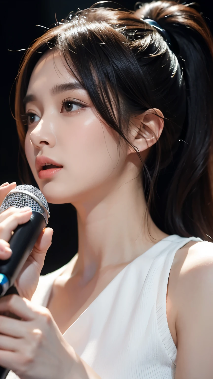 Fashionable beautiful woman singing into the microphone with concentration,Upper Body