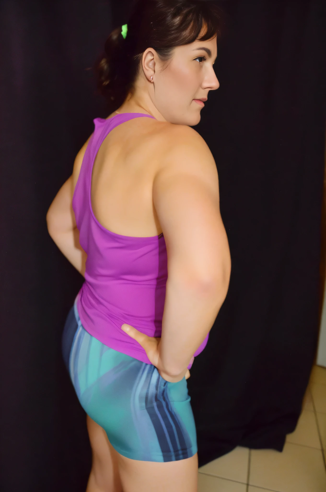woman in a purple tank top and blue shorts in front of a black curtain, arms to the side, arms behind the back, left arm and back lowered, insect forearms bent, side pose, shoulders hunched, muscles swollen, showing shoulder from behind , photo taken from behind, toned arms, 3/4 side view, flexing big muscles, making sassy pose, 40 year old woman, sarcastic full body pose, photo shoot, lewd pose. Shapely woman in purple top and blue shorts posing for a photo, arms to the side, half-length photo, tight photo, half-length photo, half-length photo, violet tight top, half-body close-up, portrait photo of full body, full body and headshot, full body photography, centered full body photo, 40 year old woman, 4k, portrait photo, light violet tank top, profile photo, sweaty face, 3/4 solo portrait, photo suitable, black background. She is wearing a vibrant pink-purple sports tank top and mixed shorts (((blue-gray-green-black))), suggesting an active lifestyle or athletic attire for working out. Sharp photo, high quality, high resolution (ultra quality masterpiece), Ultra HD, high contrast, 16K. Masterpiece: 1.3, high resolution, (photographically realistic), NUDE, NUDITY, NFSW.