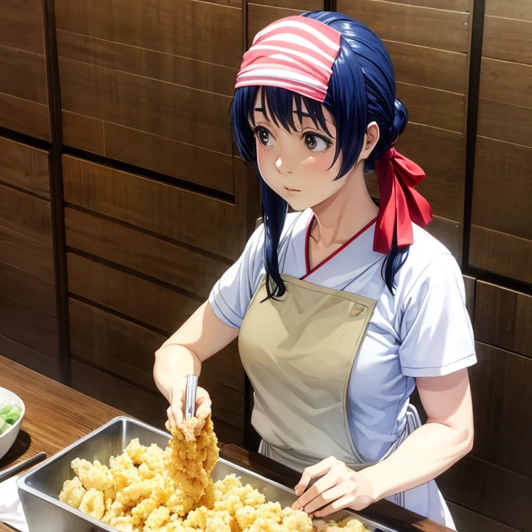 A woman with a towel wrapped around her head preparing a large amount of tempura in the kitchen of a Japanese restaurant　highest quality　Wearing an apron