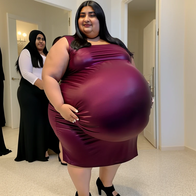 Extremely Hyperpregnant Qatariwoman with huge belly wearing a dress