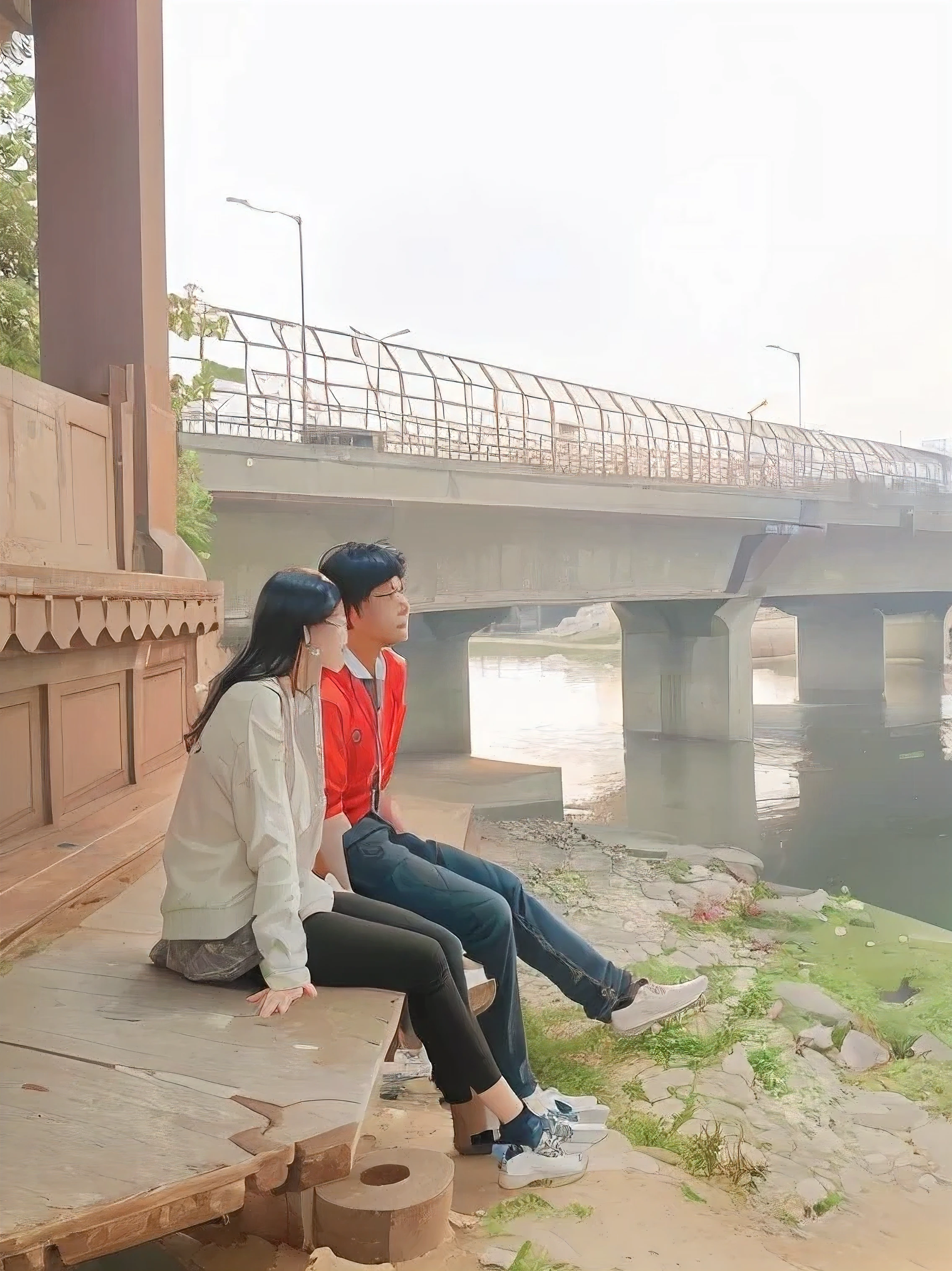 there are two people sitting on a bench next to a river, sitting under bridge, sitting near a river, candid picture, candid photograph, candid photo, photo taken in 2 0 2 0, shot on canon eos r 5, shot on canon eos r5, beside the river, next to a river, taken with canon eos 5 d mark iv