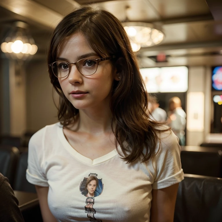 She is a woman in her twenties, with an appearance that combines the classic elegance of Jenna Coleman with the touch of determination of Resident Evil's Jill Valentine. Her brown hair falls in soft curls, framing a delicate face adorned with expressive, penetrating eyes. She wears slightly thick glasses that add an intellectual charm to her look. She wears a white shirt with a rock print. Her posture is confident, and her presence radiates a mixture of intelligence, courage, and grace. She is in a movie theater