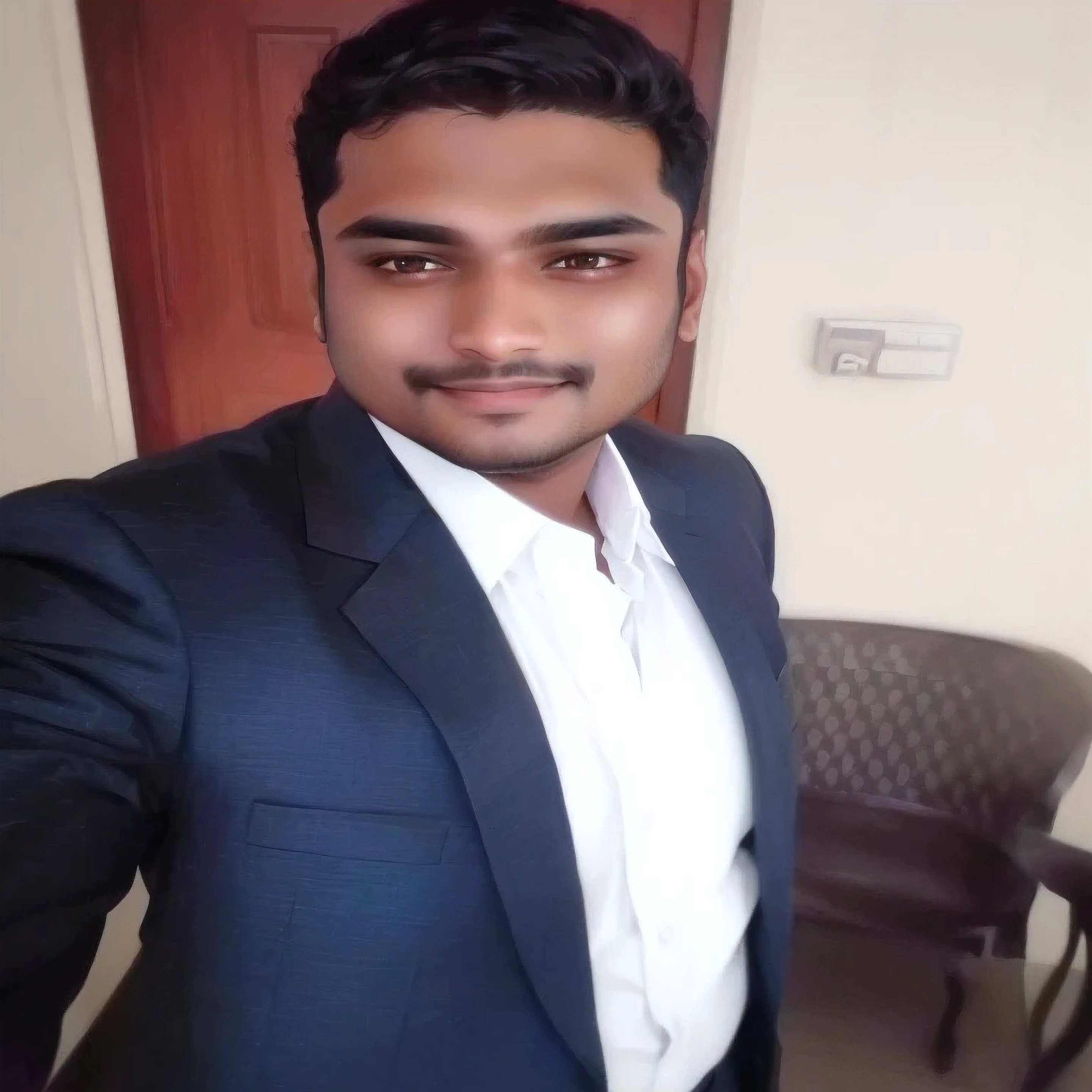 there is a man in a suit and white shirt posing for a picture, jayison devadas, with accurate face, vinayak, with lovely look, professional profile picture, with kind face, blurry image, very very low quality picture, without beard, with a happy expression, front profile!!!!, candid picture, without helmet, ayan nag, very artistic pose, selfie photo