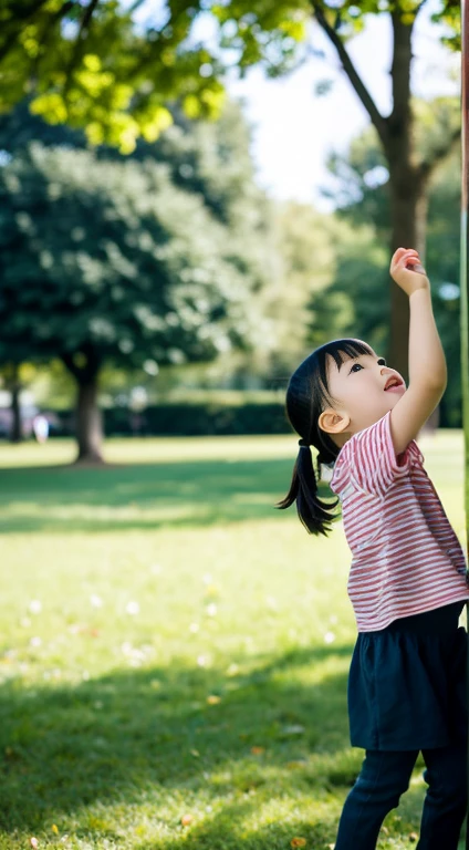 3 year old girl Playing in the park