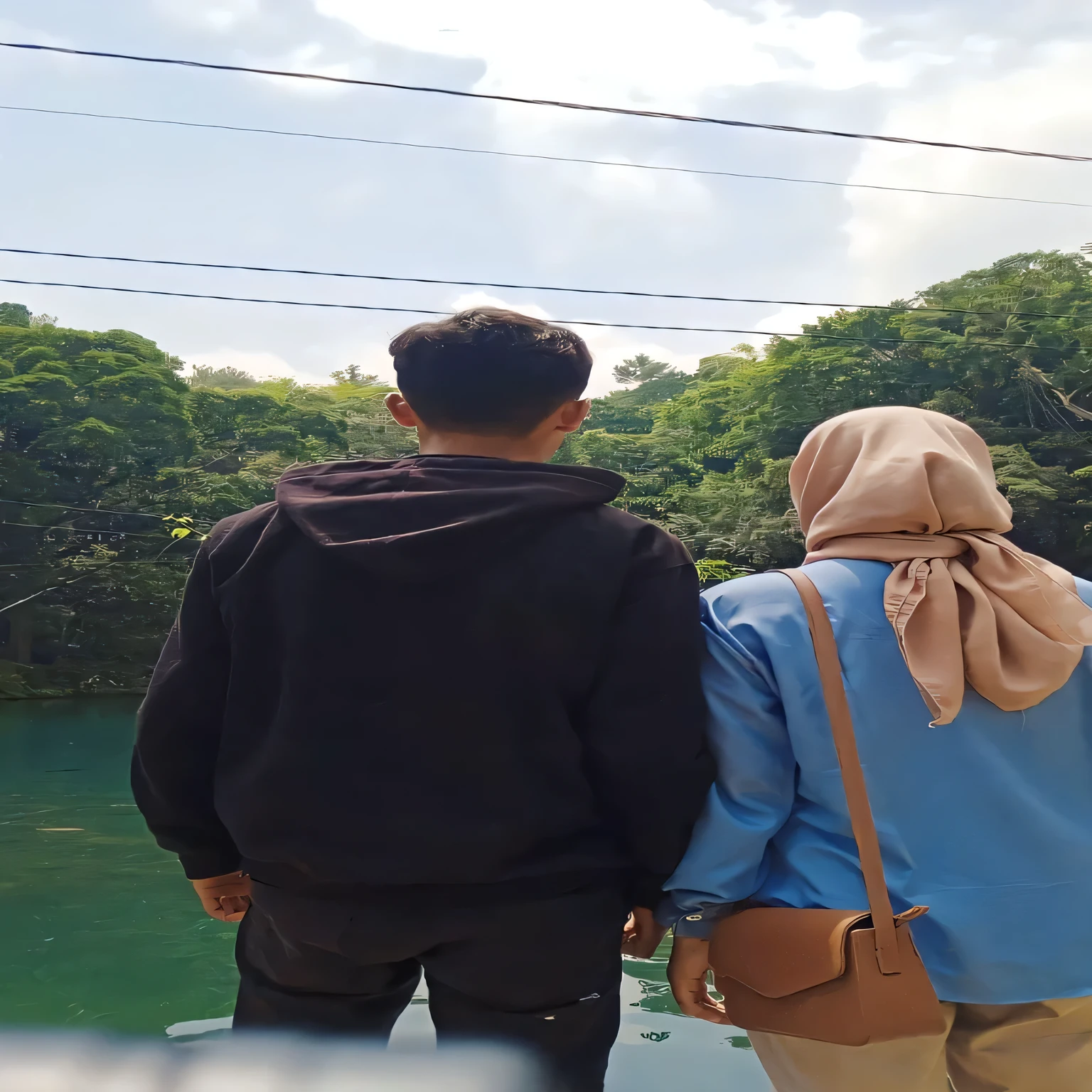 there are two people standing next to each other on a boat, couple, connected with hanging bridge!!, in a scenic background, in front of a forest background, lovely couple, 😭🤮 💔, beautiful scene, looking at each other mindlessly, on a bridge, the most beautiful scene, in a scenic environment, hills in the background, aesthetic shot