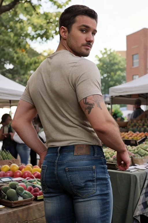 JordanBrandt, 35yo, wearing a t-shirt and jeans, at the farmers market, backside 