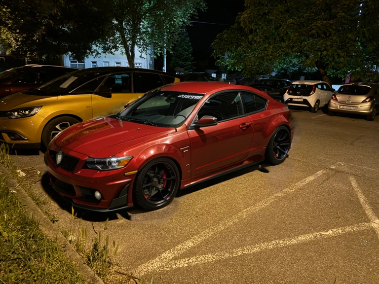 Sport car wide body kit red color with black rims
