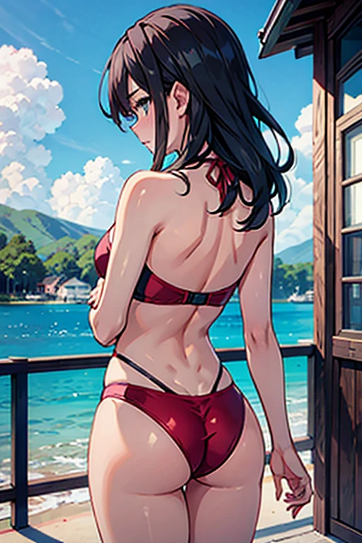 girl in tight swimwear facing away from camera blushing