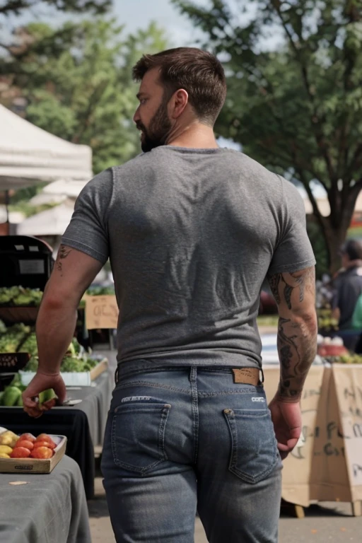 JordanBrandt, 45yo, short mustache and beard, wearing a t-shirt and  gray jeans, at the farmers market, backside bent over walking