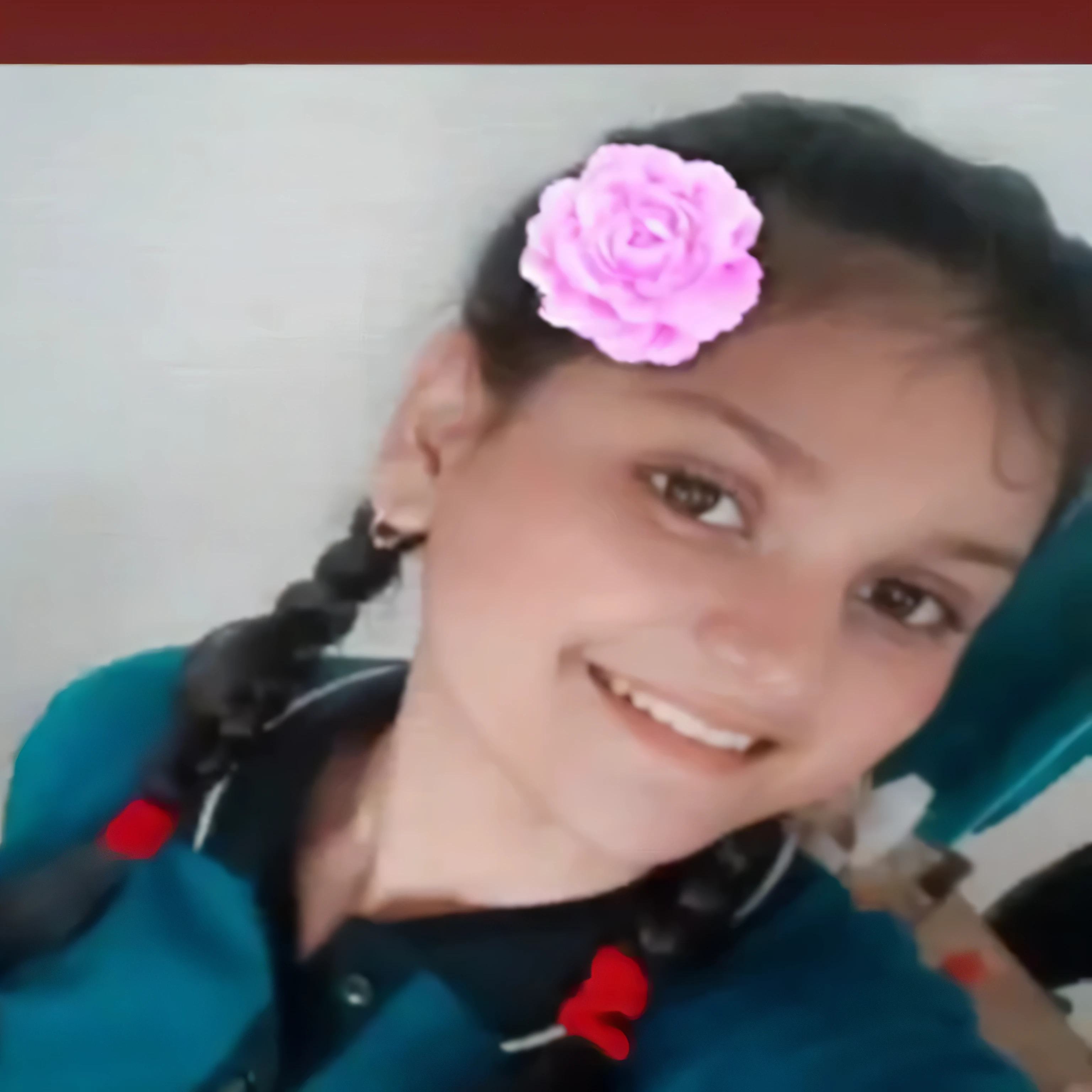 there is a girl with a flower in her hair, very very low quality picture, with a beautifull smile, lovely smile, young , 1 6 yean cute vtuber, 18 years old, cute smile, 19-year-old girl, tiktok video, slight cute smile, she is smiling, friedly smile