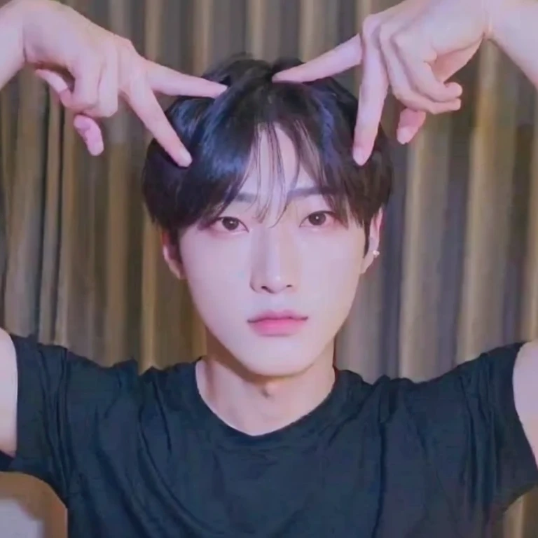 arafed asian man with black shirt holding his hands over his head, jungkook, cai xukun, wan adorable korean face, headshot profile picture, kim doyoung, he has an elongated head shape, taejune kim, hyung tae, clasps his bangs in one hand, jinyoung shin, inspired by Bian Shoumin, with short hair, inspired by Kun Can, sunoo enhype 