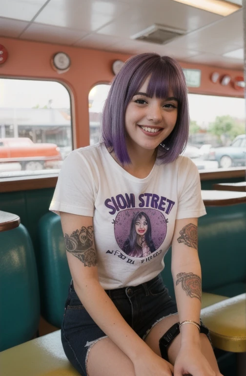street photography photo of a young woman with purple hair, smile, happy, cute t-shirt, tattoos on her arms, sitting in a 50s diner