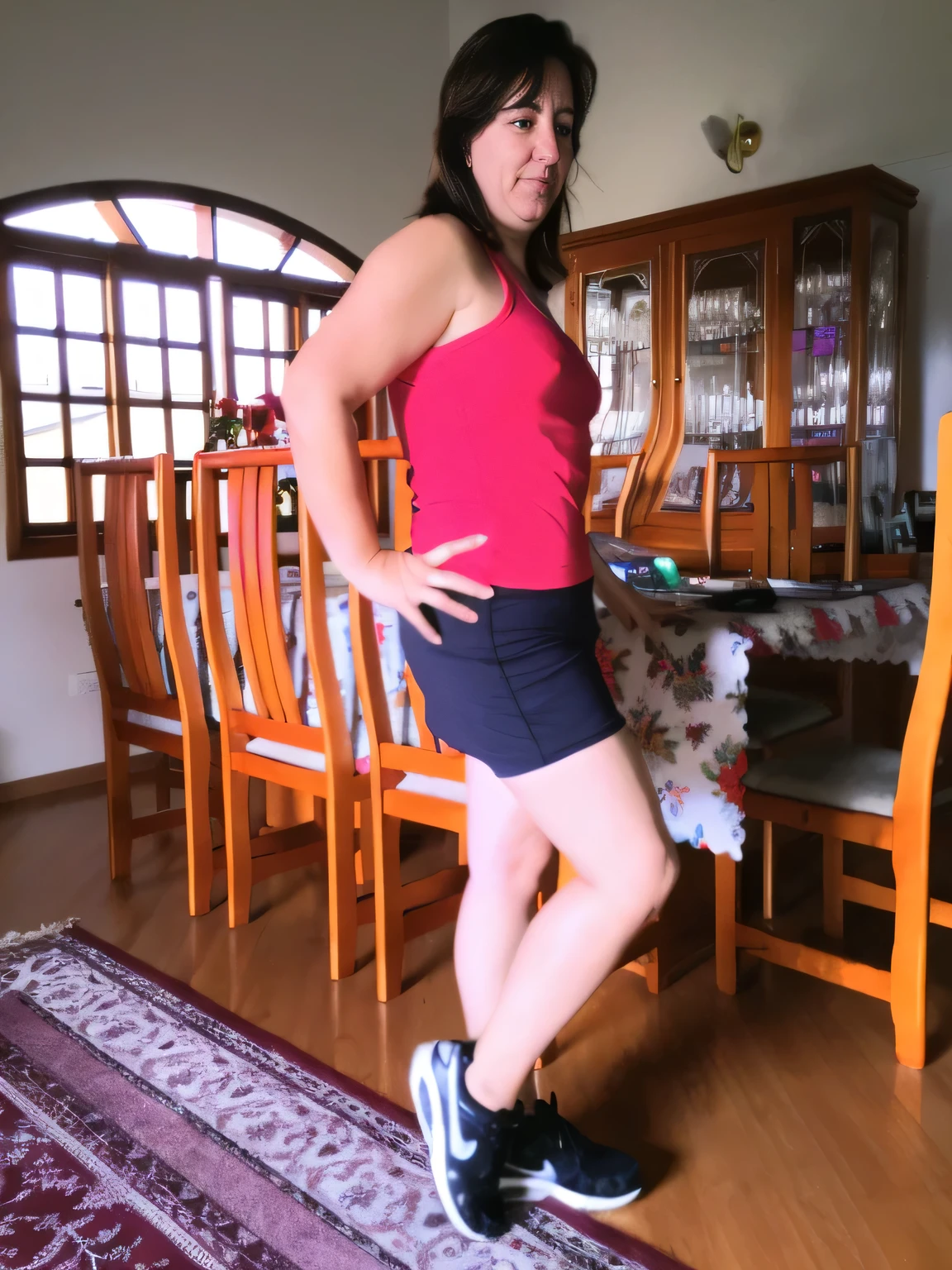 there is a woman standing in a room with a table and chairs, side pose, doing a sassy pose, fit pic, wearing red shorts, in good physical shape, leg and hip shot, lunging at camera :4, posing!!, cottagecore!! fitness body, full body wide shot, skinny waist and thick hips, side view of her taking steps