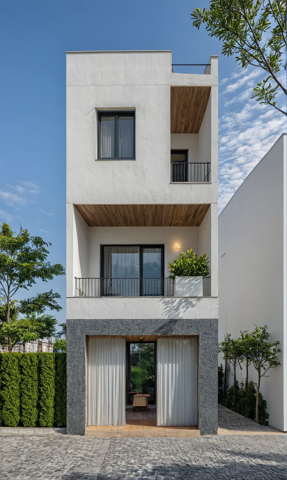 Masterpiece, high quality, best quality, authentic, super detail, outdoors, onestoreyvillaXL, aiaigroup, house style modern on the street ,stairs, white wall ,road,pavement, grass, trees, sky, cloud, (daylight:1.1)
