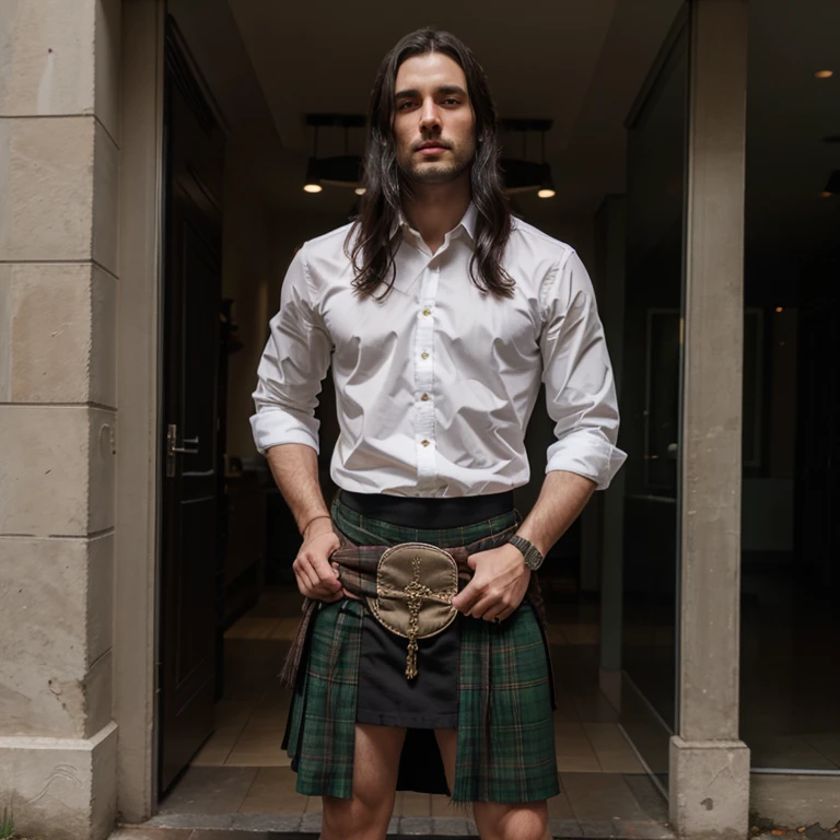 Dark hair guy in knee length kilt