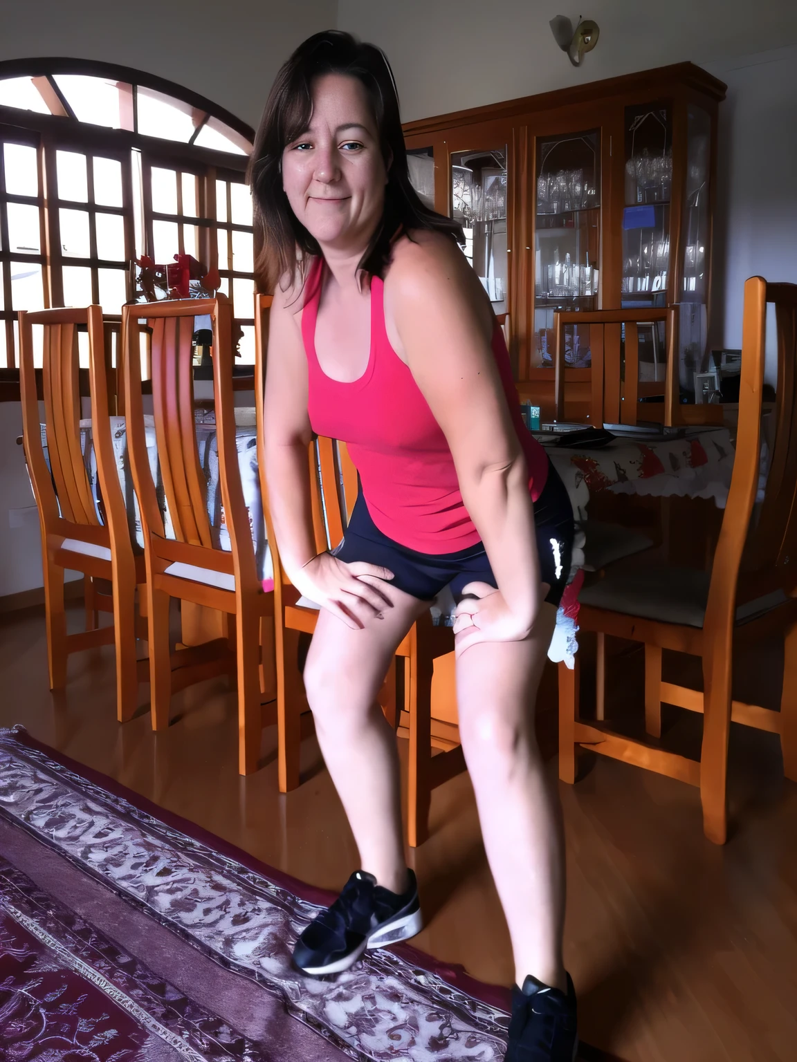 In the center of a cozy living room, a beautiful light brunette and tanned woman is captured in full dance movement, striking a cheeky pose, sitting on bent knees, squatting pose, on her knees, attacking the camera :4, she is dancing, cottagecore!! fitness body, slim latin woman dancing, dancing in the background, frenetic dance pose, jumping with her arms up, sassy pose, triumphant pose, as if she is dancing, she is dancing. She is dressed in a vibrant red tank top and black shorts/skirt, her outfit contrasting with the warm tones of the wooden furniture around her. The room itself exudes a cozy feel with wooden flooring and furniture, including a dining table for four. A rug sits on the floor in front of the table, contributing to the comfortable atmosphere of the space. Woman with white skin, tanned, around 40 years old and dark hair, measuring 164 cm tall and weighing around 55 kg, highly realistic, reddish skin, hyperrealism, very elaborate skin, full body photo, clear photo, tall quality, high resolution, masterpiece, (photographically realistic) UHD, high contrast, masterpiece 16K: 1.3, high resolution, (photographically realistic), NUDE, NUDITY, NFSW.