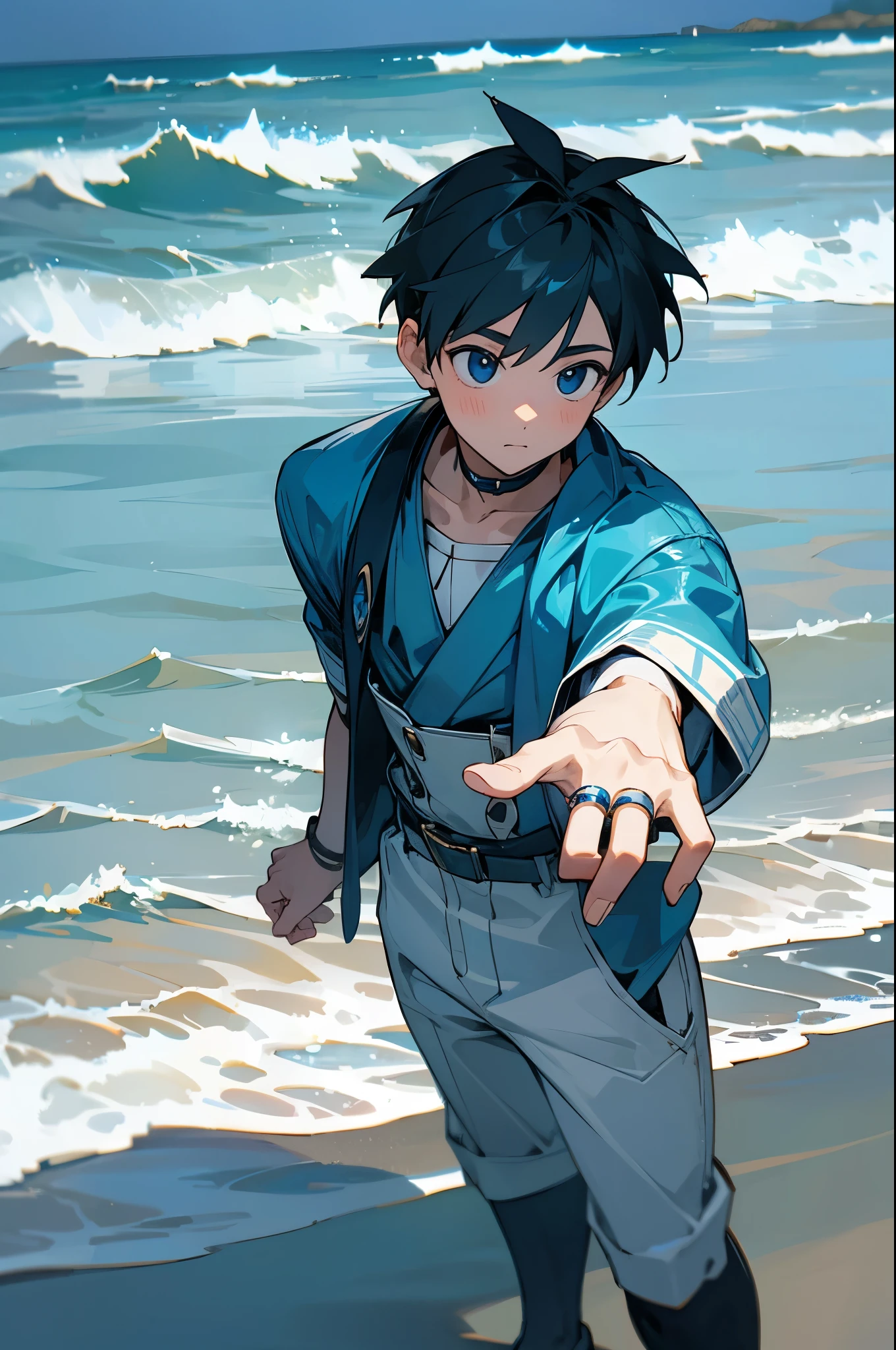 boy with blue ring on finger on a beach with water aura