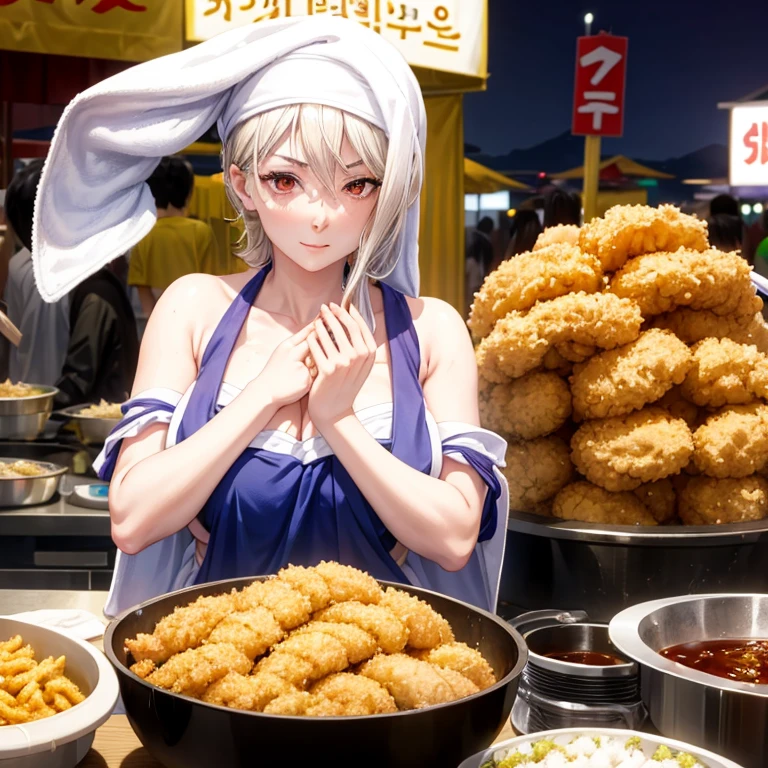 A woman with a towel wrapped around her head making a large amount of tempura at a night market in Korea　highest quality　Wearing an apron
