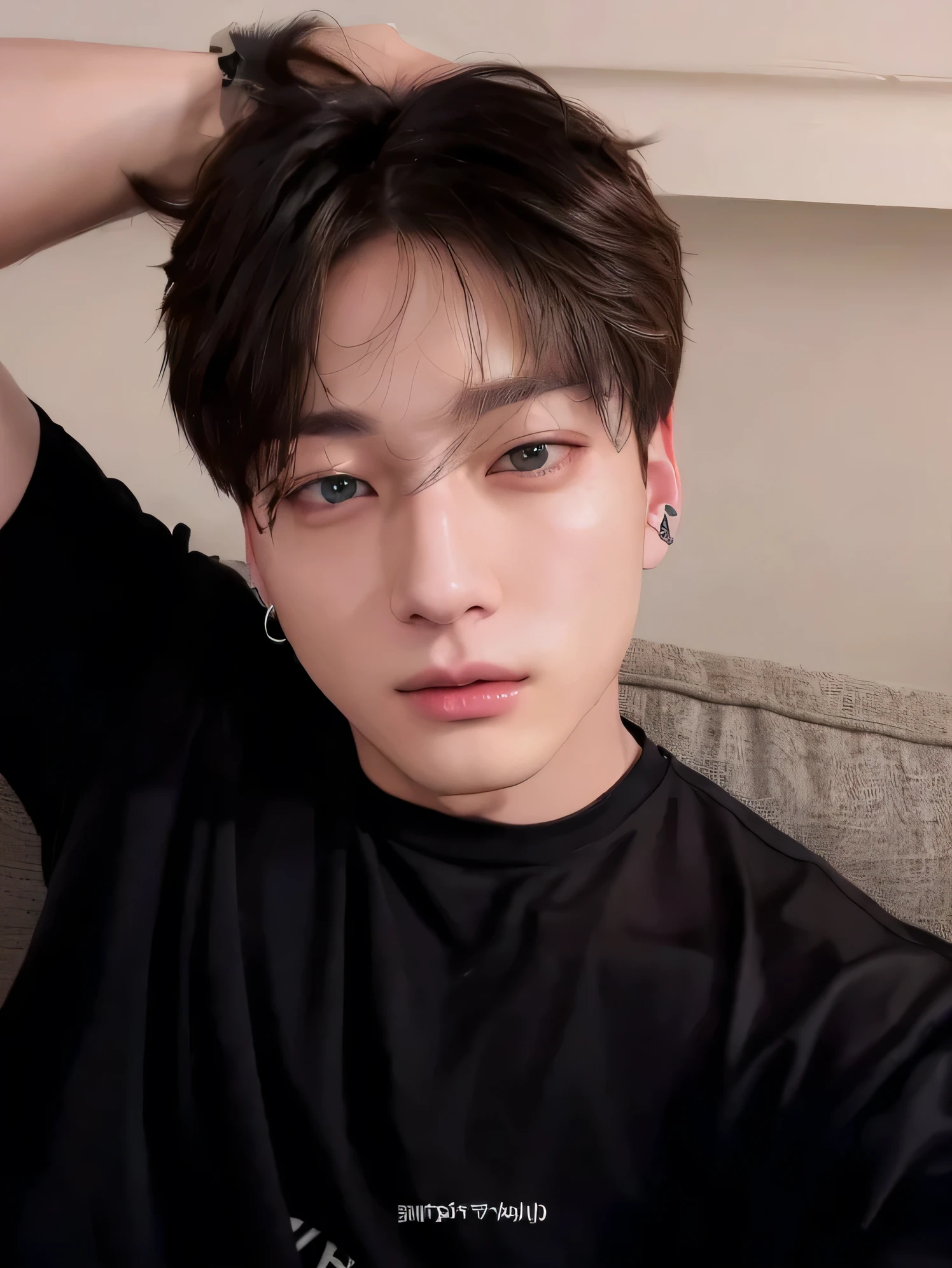 There is a BLONDE man in a black shirt sitting on a sofa, jungkook, Jungkook, jeon Jungkook, Jeon, pale korean adorable face, Jeon Jung Kook, Jeon Jungkook, rubio, Jeon, Jungkook's swollen right eyelid, Jung Kook, de pelo rubio, con pelo corto, taken in the early 2020s